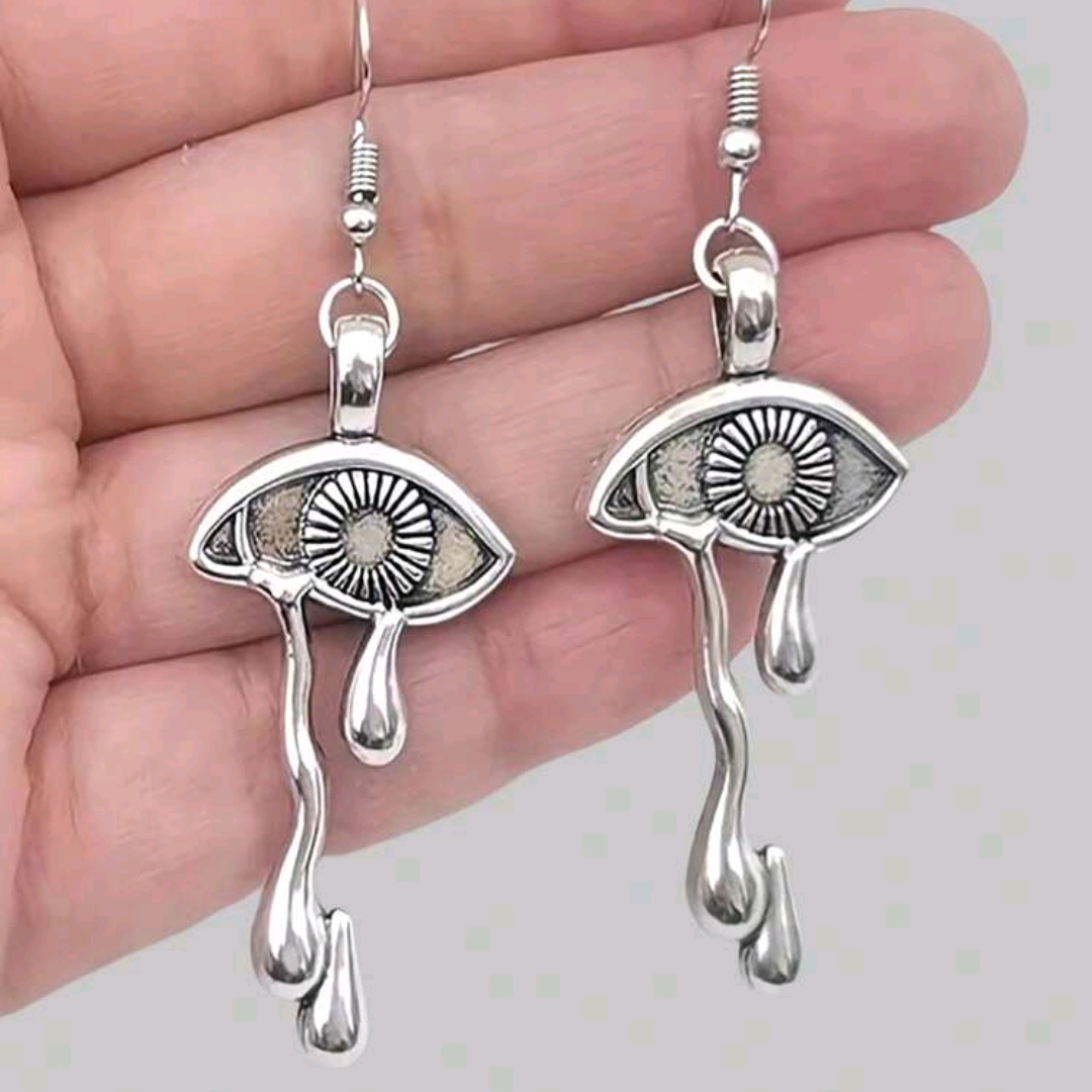 Hot Topic Silver Eye Drip Earrings 49$